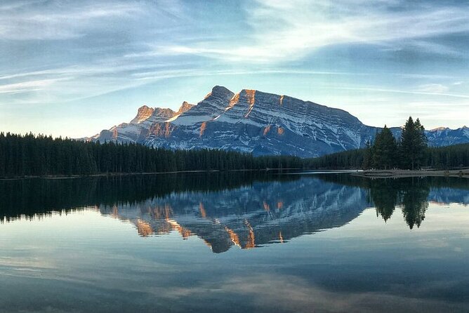 Banff Gondola Hot Springs Bow Falls and Three Lakes tour - Two Jack Lake: The Calm Counterweight to the Busier Spots