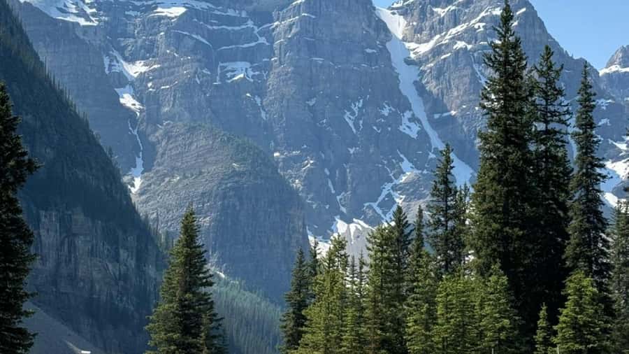 Banff: Gondola, Hot Springs, Bow falls & Three lakes tour - Bow Falls and Surprise Corner: The Iconic Photo Ladder