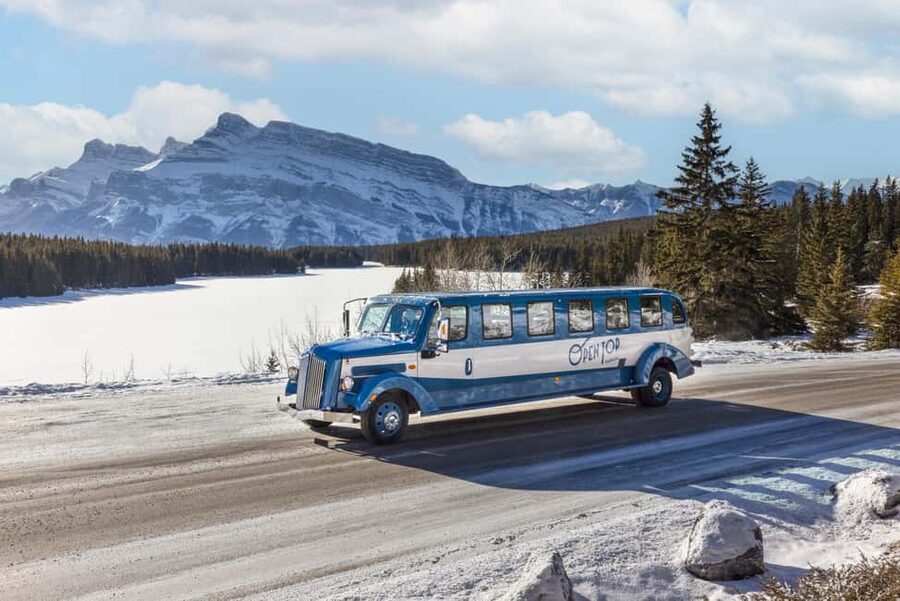 Banff: Winter Tour with Dinner & Nightrise at Banff Gondola - Open-top vintage car touring: the ride that makes the photos easier