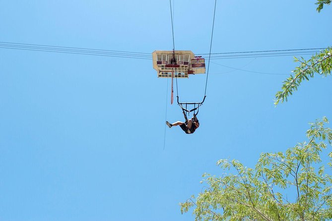 Extreme Swing - Fly from the Glass Bottom Gondola - The Giant Swing: Free-Fall to 87 mph Pendulum