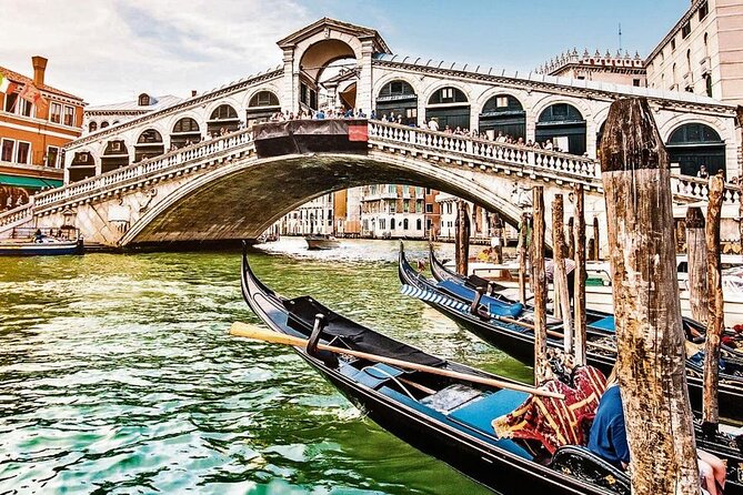 Morning Magic: Venice City Walk and Gondola Tour - Teatro La Fenice and the architecture-story connection