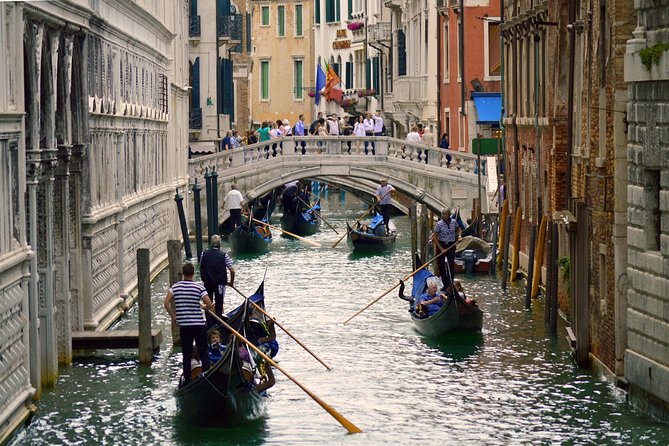 Romantic Venice: 30 Minute Gondola Ride with Serenade - Shared flotilla romance: what it feels like on the water