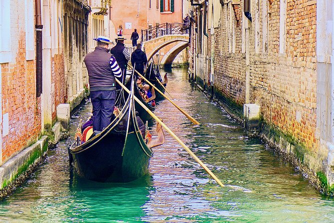 Venice: Classic 30-Minute Gondola Ride Through the Canals - Shared gondola reality: space, strangers, and seating comfort